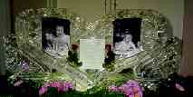 Baby photos and accouncement embedded into two Ice Hearts